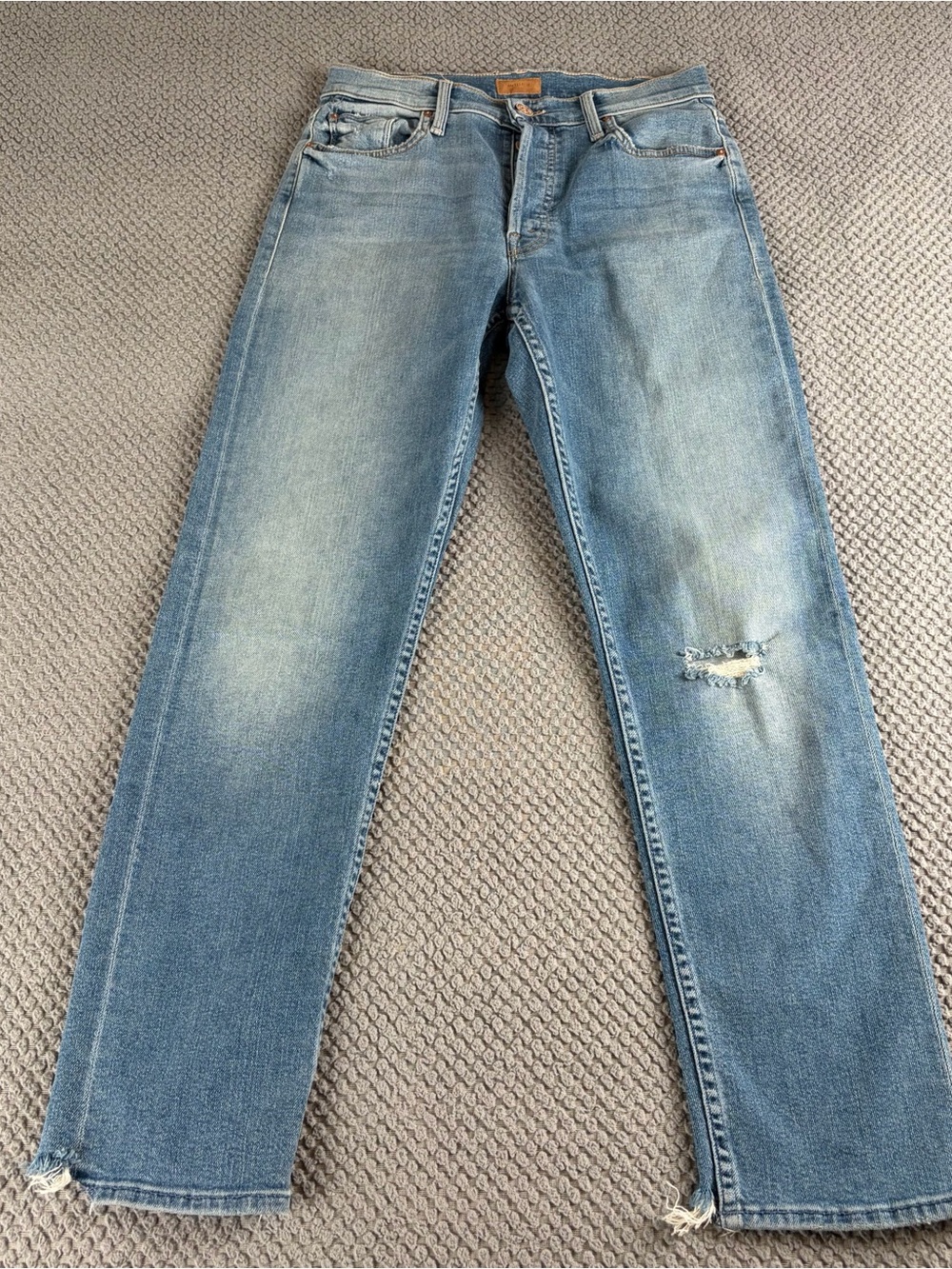 MOTHER Straight Leg Jeans in Light Blue Denim with Distressed Knee